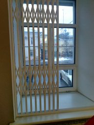 Раздвижные решетки на окна и двери 1